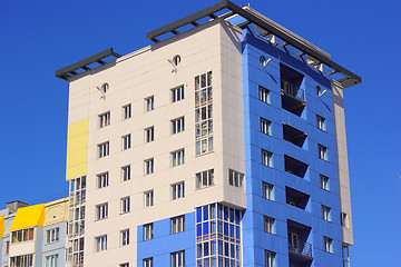 Image showing The inhabited high house against the blue sky