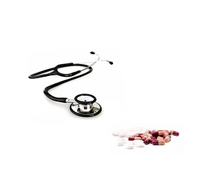 Image showing doctors stethoscope with pills