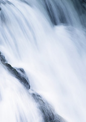 Image showing water cascade streaming down a lasher