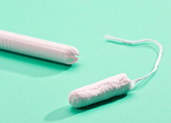 Image showing cardboard applicator tampon on white background