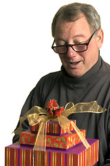 Image showing man with christmas hanukah gifts