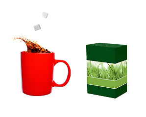 Image showing Hot cup of tea and sugar cubes and tea box