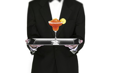 Image showing Waiter holding cocktail on silver tray