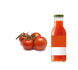 Image showing Full glass of fresh tomato juice and tomatoes