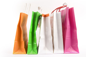 Image showing Assorted colored shopping bags on a white background