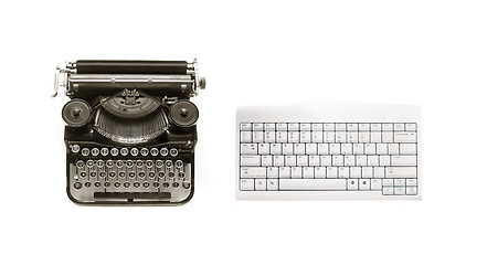 Image showing Old typewriter and modern keyboard