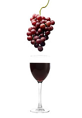 Image showing red wine glass and grapes