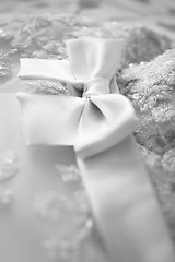 Image showing bridesmaid dress with a large silk bow