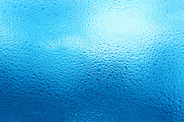 Image showing natural water drops on glass