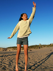 Image showing Happy girl on the beach