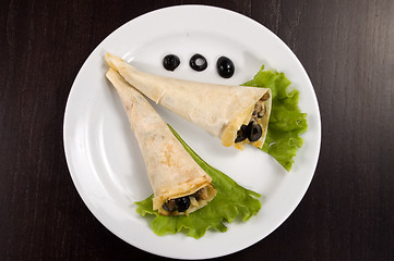 Image showing Pancakes with mushrooms and olives.