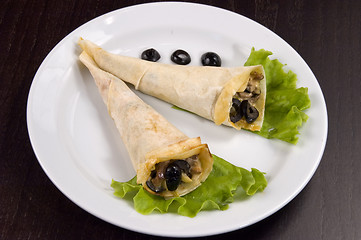 Image showing Pancakes with mushrooms and olives.