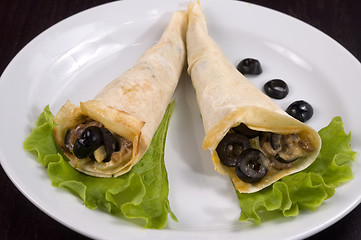 Image showing Pancakes with mushrooms and olives.