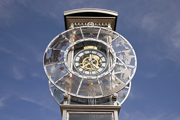 Image showing The large round hours.