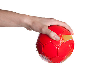 Image showing A hand hold a red ball.