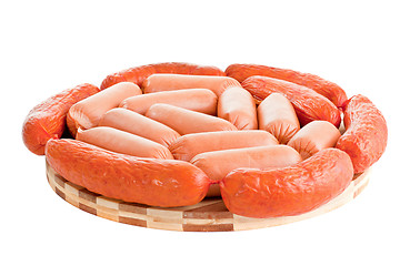 Image showing delicious sausages on board