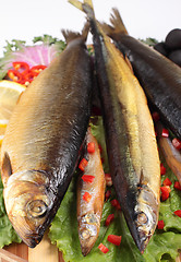 Image showing fish on plate with red pepper