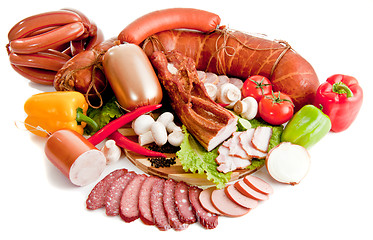 Image showing sliced sausages with vegetables and red papper