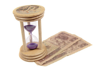 Image showing Hour Glass wiyh money isolated