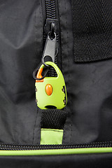 Image showing Green lock on a bag's zipper