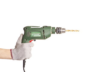 Image showing hand handling an electric drilling machine