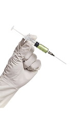 Image showing Hand holding syringe isolated on white