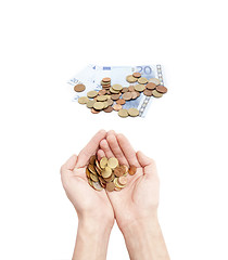 Image showing Male hands holding coins isolated