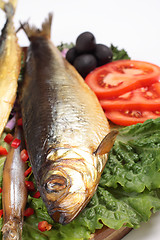 Image showing fish with lemon on plate