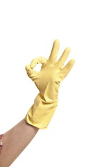 Image showing hands in yellow gloves isolated on white