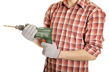 Image showing hands handling an electric drilling machine