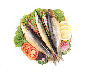 Image showing fish with lemon on plate