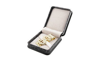 Image showing golden clip in box isolated