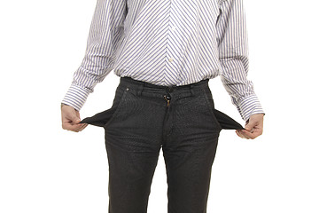 Image showing businessman showing the pocket of his pants empty