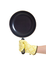 Image showing hand in gloves holding pan