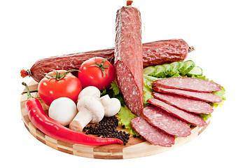 Image showing sliced sausage with vegetables and red papper