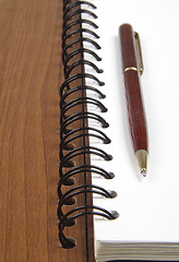 Image showing wooden notebook close up isolated