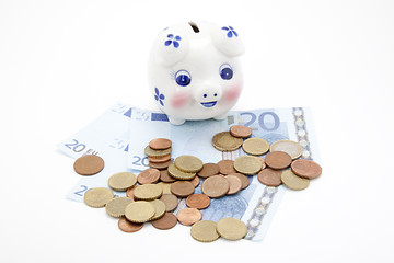 Image showing coins and euro with piggy bank