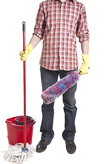 Image showing Young sweeping man workwear. Isolated