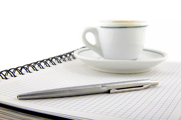 Image showing blank page, empty cup of coffe, pen