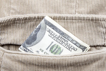 Image showing Close-up of hundred dollar bill in pocket