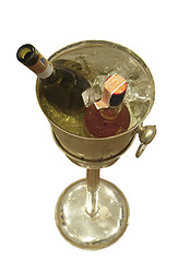 Image showing Wine and liquor bottles in a cooler