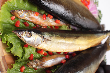 Image showing fish on plate with red pepper