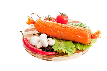 Image showing sliced sausage with vegetables and red papper
