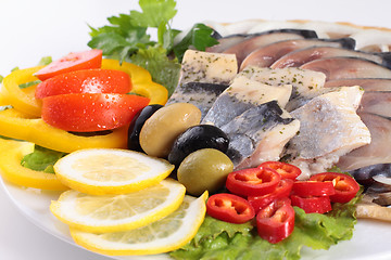 Image showing fresh fish on dish with vegetables