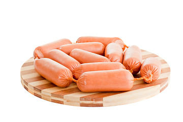 Image showing delicious sausages on board