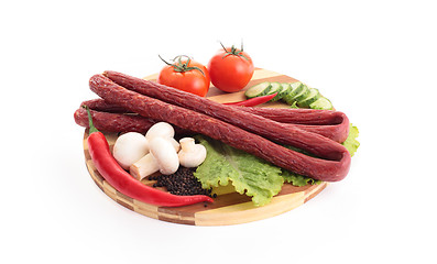 Image showing sausage with salad and spices