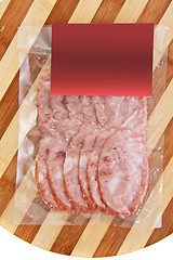 Image showing sliced meat packaged on plate