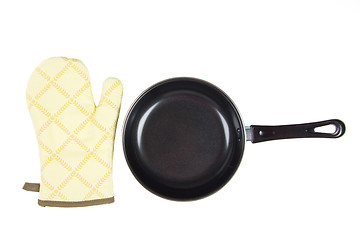 Image showing Kitchen glove with pan on a white