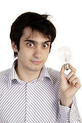 Image showing young man coming up with an idea or solution