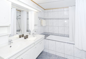 Image showing Light bathroom with two sinks